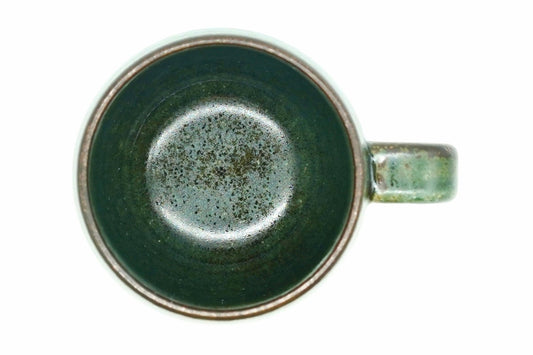 Fukamidori Yunomi from above, the dark green inside with a speckled bottom and a dark brown rim