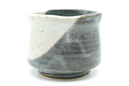 Tsukikage Yunomi cup on its own, white and blue-grey two-tone glaze with a sandy foot