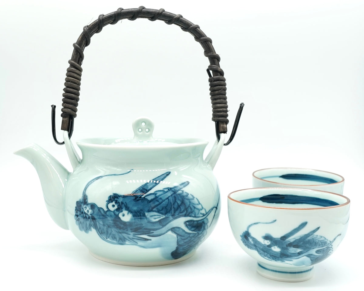 Dragon Japanese Tea Set: a Hasami porcelain dobin teapot with a woven handle and two matching blue dragon teacups