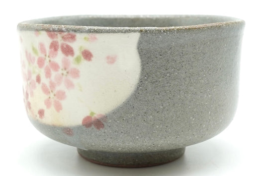Harugasumi Yunomi turned to show the plain grey side and the edge of the blossom panel