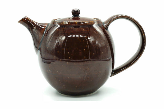 Aka Kyusu, a round Mino ware teapot in a glossy dark red-brown glaze flecked with gold, with a loop handle at the back