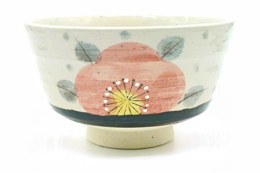 Aka-Tsubaki matcha bowl, cream with a large salmon-pink camellia, grey-blue leaves and a dark band above a bare cream foot