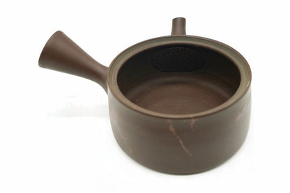 Akane-Shibori Kyusu with the lid off, the built-in ceramic strainer at the spout