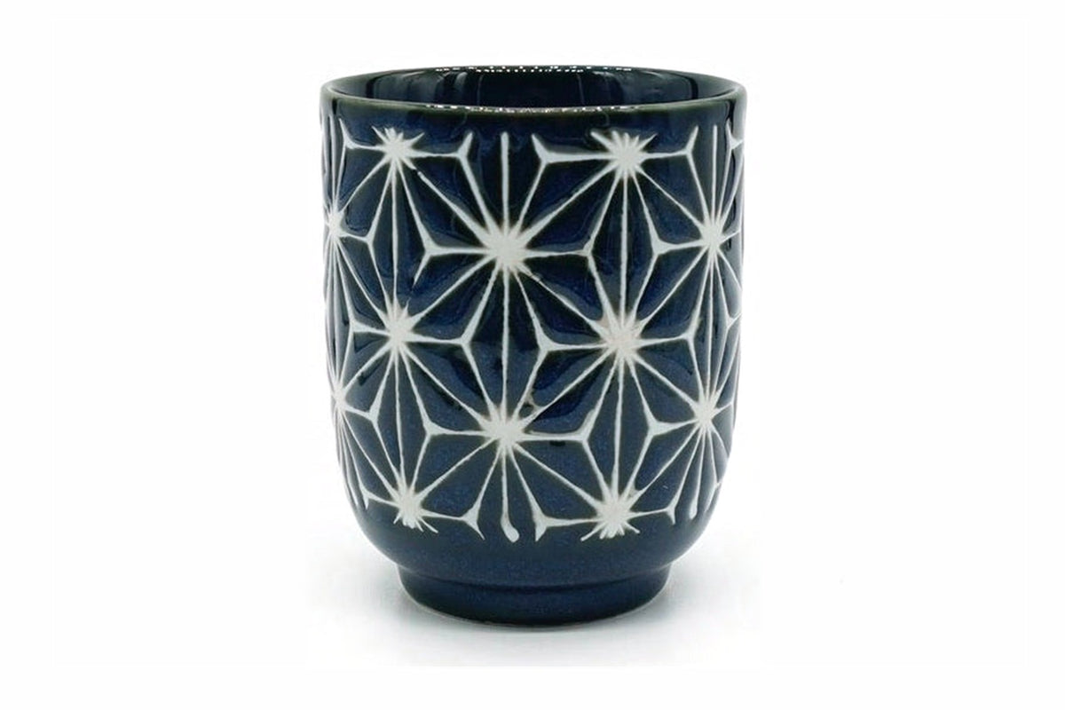 Asa Yunomi, a tall navy Mino ware teacup carved with a white six-pointed star pattern, front view