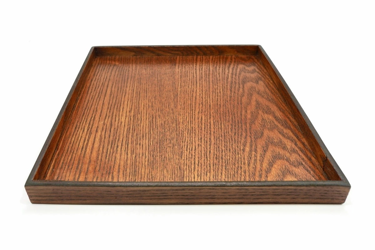 Chairo Kaku-bon, a square wooden tea tray with a strong grain, a low straight rim and a darker top edge, seen from the side