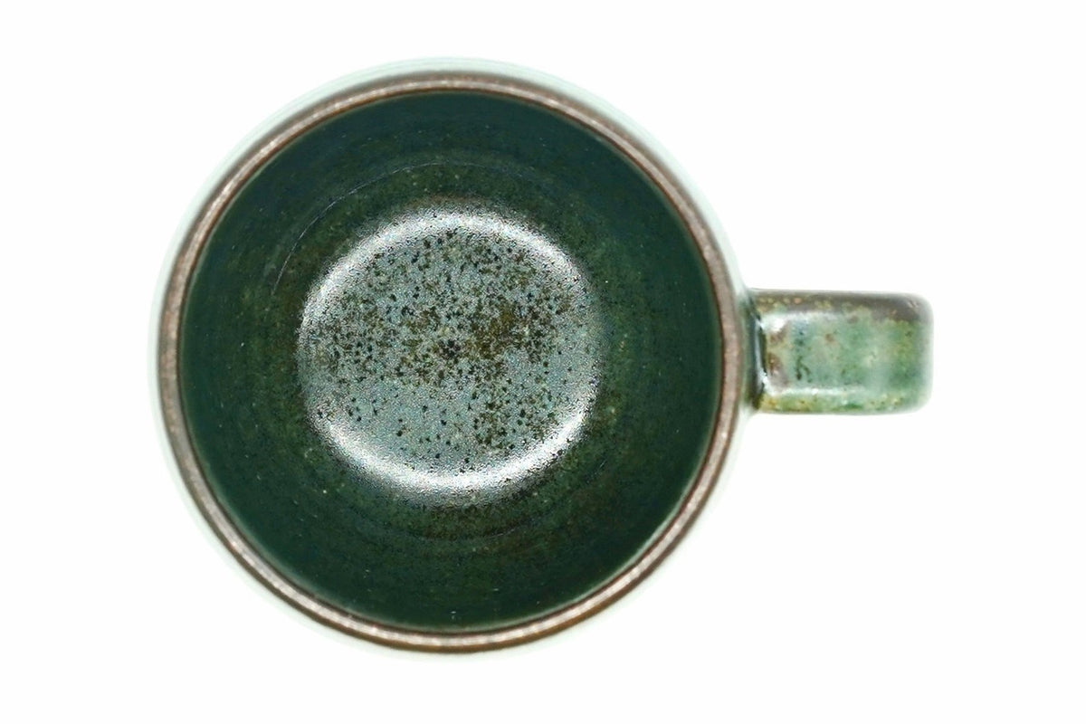 Fukamidori Yunomi from above, the dark green inside with a speckled bottom and a dark brown rim