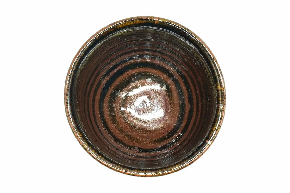 Ginga Yunomi from above, dark brown inside with rust-brown rings and an amber-flecked rim