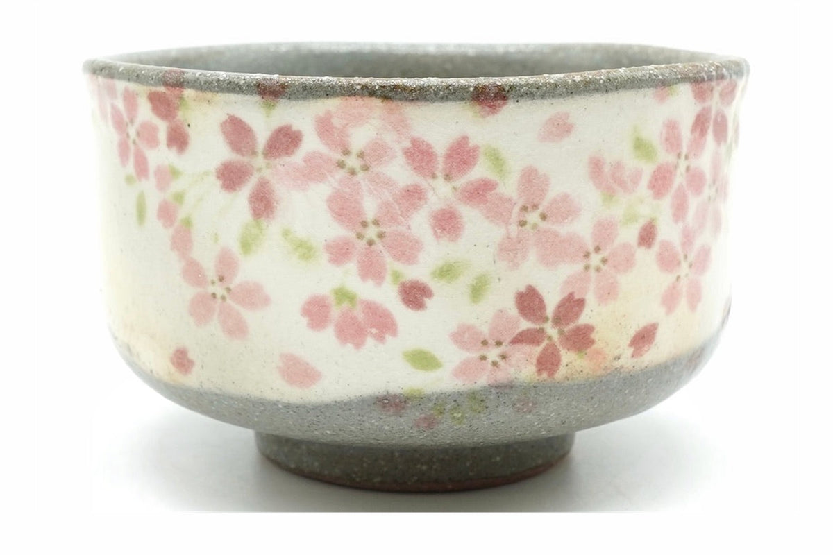 Harugasumi Yunomi, a speckled grey Mino ware teacup with a white panel of pink cherry blossoms