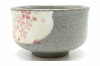Harugasumi Yunomi turned to show the plain grey side and the edge of the blossom panel
