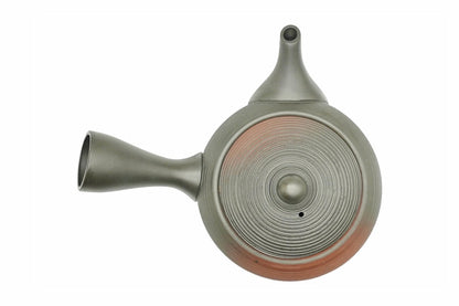 Hinode Kyusu seen from above, the dark ridged lid with red clay glowing through the rings