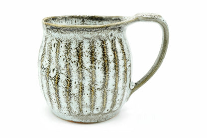 Jōmon 2 Yunomi, a big white Mino ware mug with brown-black speckled cord-like ridges, front view