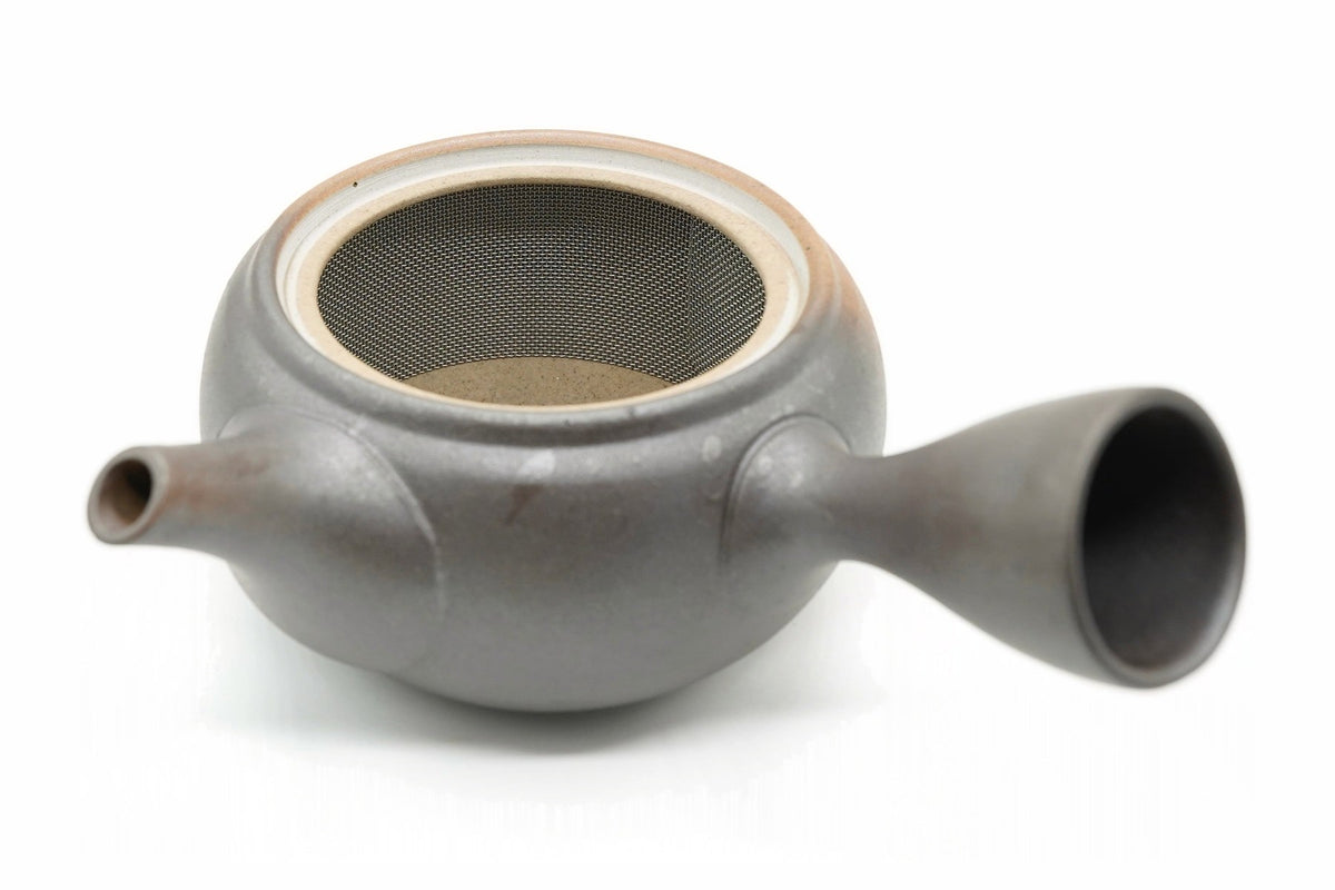 Kaki Kyusu with the lid off, the band of stainless mesh around the inner wall