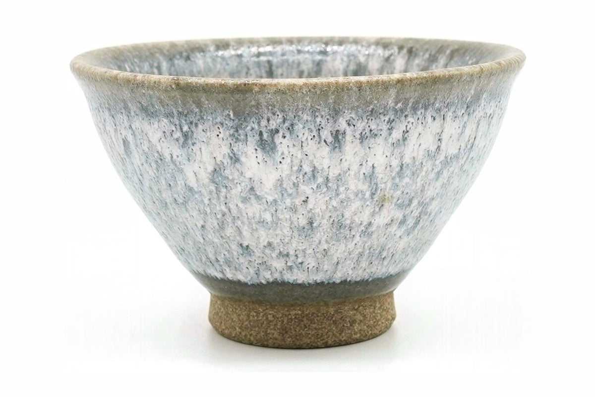 Kasumi Yunomi, a flared Mino ware teacup in a mottled white and grey glaze like mist, front view