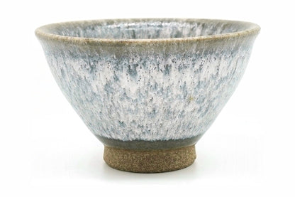 Kasumi Yunomi, a flared Mino ware teacup in a mottled white and grey glaze like mist, front view