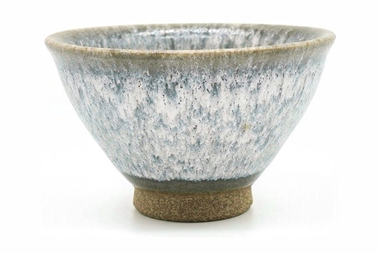 Kasumi Yunomi, a flared Mino ware teacup in a mottled white and grey glaze like mist, front view