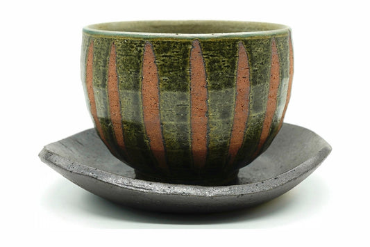 Kinoko Yunomi, a Mino ware cup with rust-orange stripes over mossy green, on a dark brown saucer