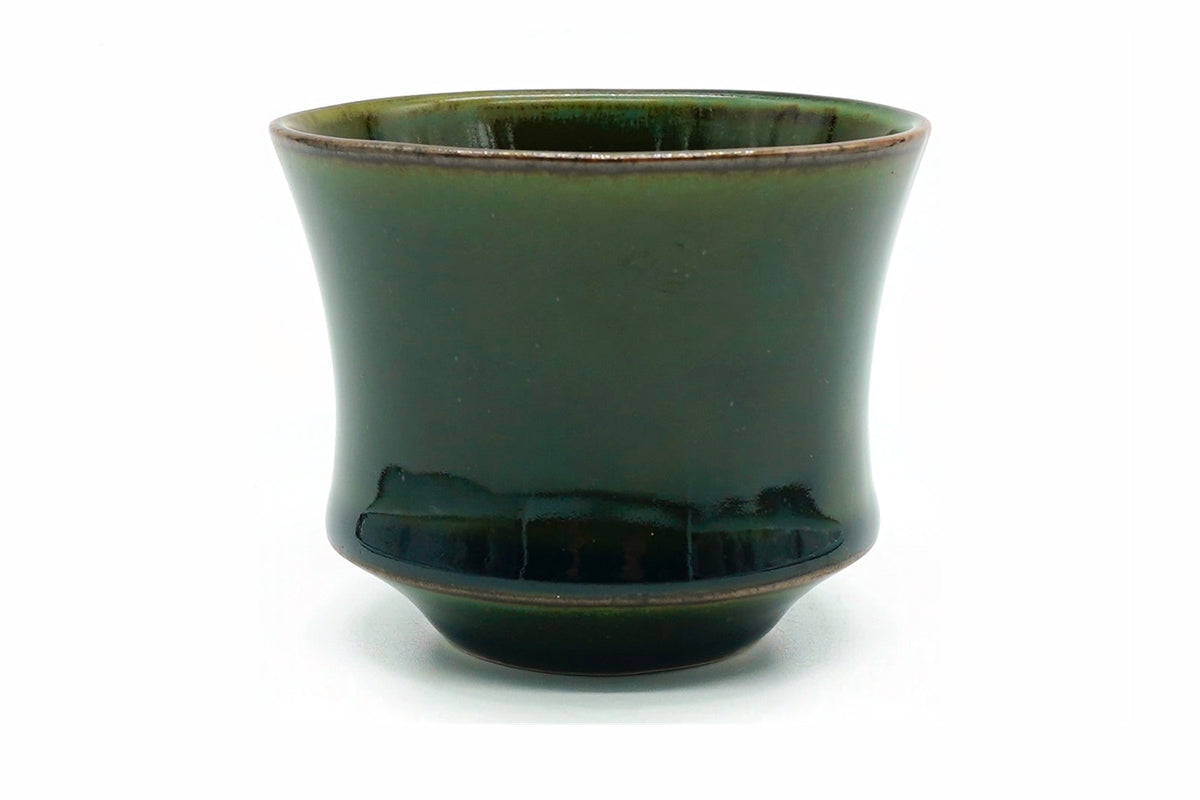 Koke Yunomi, a deep glossy moss-green Mino ware teacup flaring from a stepped foot, front view