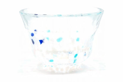 Konayuki Glass Choko, a small flared glass cup on a short foot, clear glass flecked with deep blue, turquoise and white