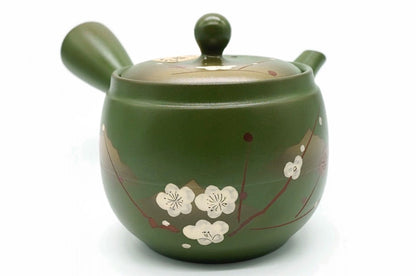Midori Kyusu, an olive-green Tokoname teapot hand-painted with white plum blossoms and a gold mountain, front view