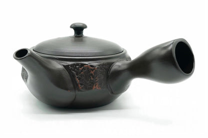Mokume Kyusu, a dark Tokoname teapot with a rough red-brown panel and a red-tipped knob, side view