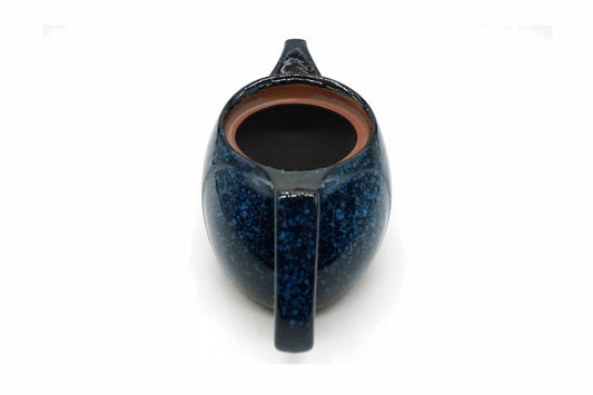 Seiko Kyusu with the lid off, the curved fine mesh over the spout opening inside