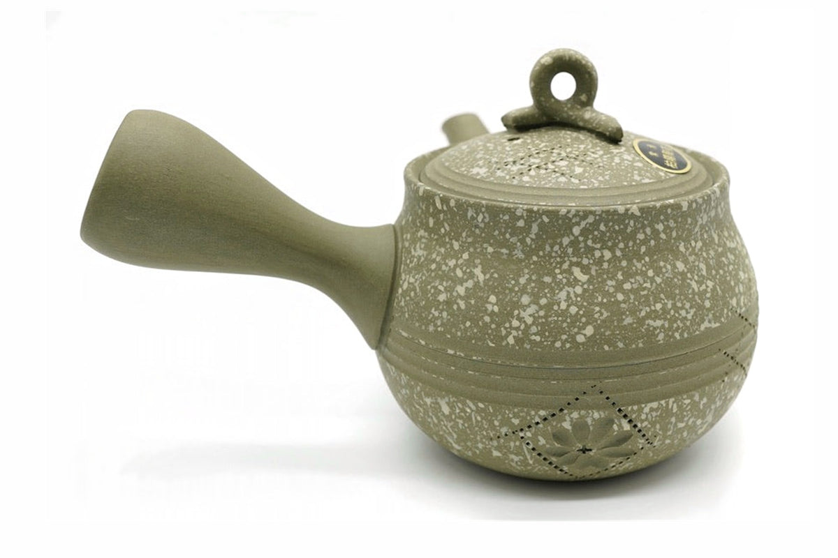 Sekka Kyusu, a stone-grey speckled Tokoname teapot with a ring knob and a small flower motif near the base, side view