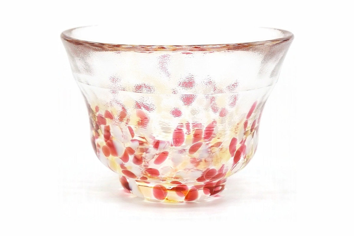 Sumomo Glass Choko, a small flared glass cup on a short foot, clear glass flecked with red, pink, white and amber
