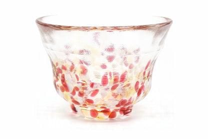 Sumomo Glass Choko, a small flared glass cup on a short foot, clear glass flecked with red, pink, white and amber