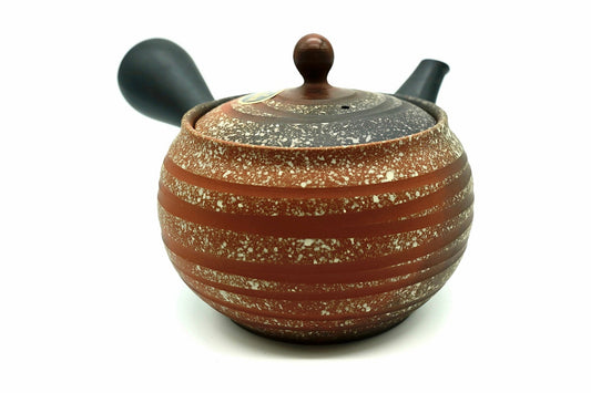 Tonbo Kyusu, a red clay Tokoname teapot ridged in bands and speckled white, with a black handle and spout, front view