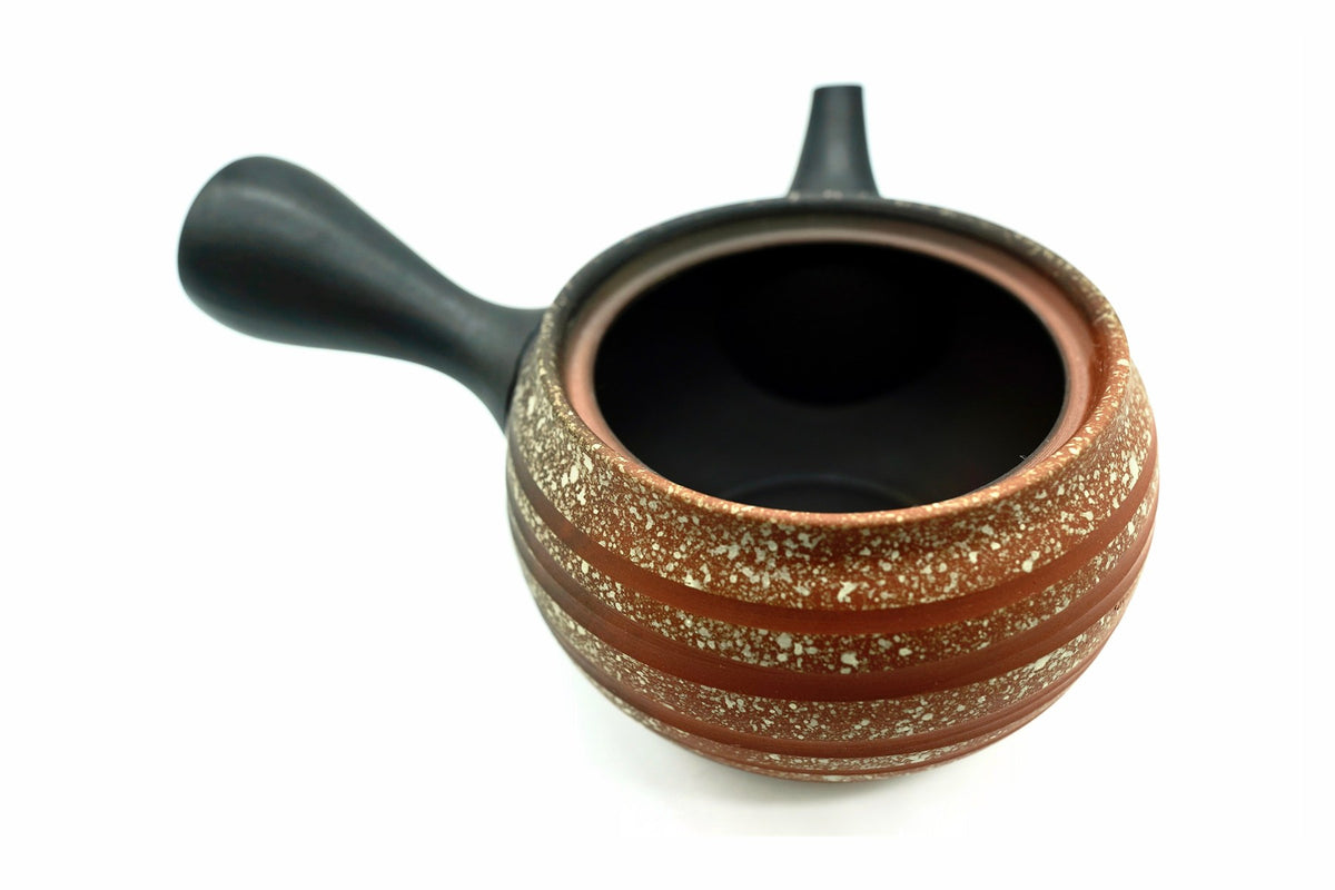 Tonbo Kyusu with the lid off, the dark inside