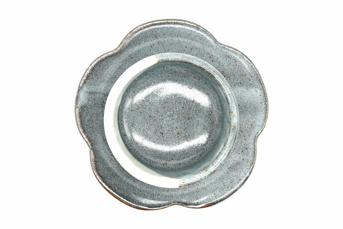 Tsukikage Yunomi flower-shaped saucer from above, blue-grey glaze with a brown edge and a raised centre ring for the cup