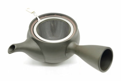 Yamazakura Kyusu with the lid off, the stainless basket strainer with its white tab sitting in the mouth of the pot
